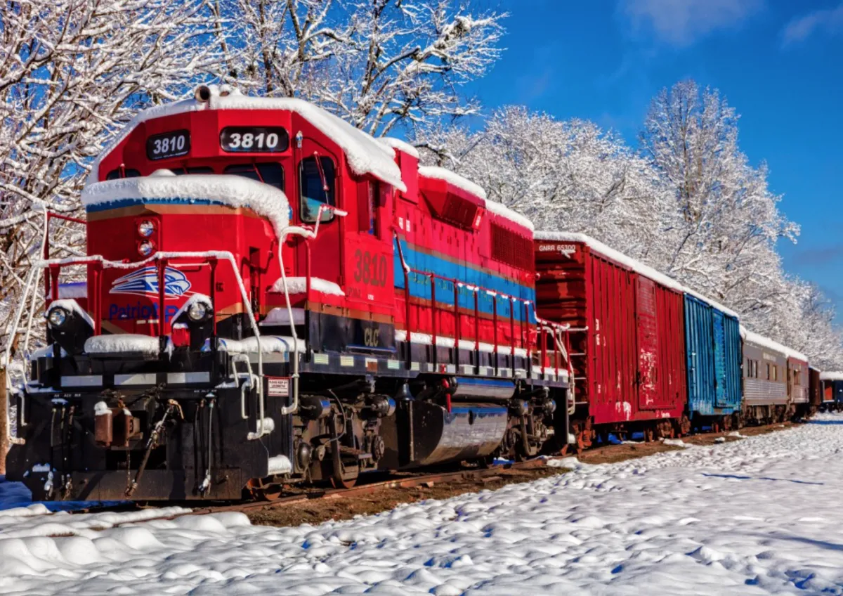 Bluebird Puzzle Landschappen|1500-1999<Rode trein in de sneeuw - puzzel van 1500 stukjes