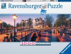 Ravensburger Panorama|Steden En Gebouwen<Avond in Amsterdam - panoramische legpuzzel van 1000 stukjes