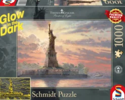 Schmidt Puzzel + Extra Item|Steden En Gebouwen<Het vrijheidsbeeld - Glow in the Dark - Thomas Kinkade - puzzel van 1000 stukjes